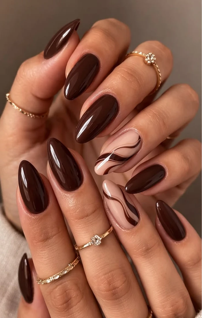 Autumn Nail Design Featuring Rich Earthy Colors and Trendy Fall-Inspired Details