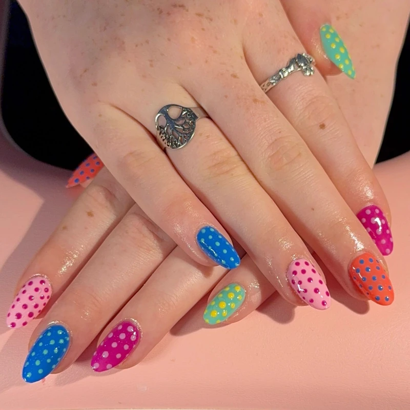 Playful Polka Dot Nail Art with a Cute and Eye-Catching Pattern Playful Polka Dot Nail Art with a Cute and Eye-Catching Pattern