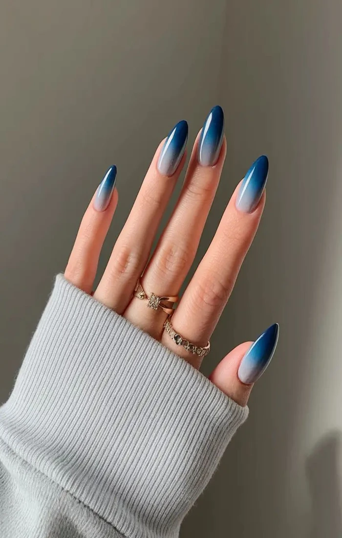 Bright blue summer nails with a glossy ocean-inspired finish on almond-shaped nails. Bright blue summer nails with a glossy ocean-inspired finish on almond-shaped nails.