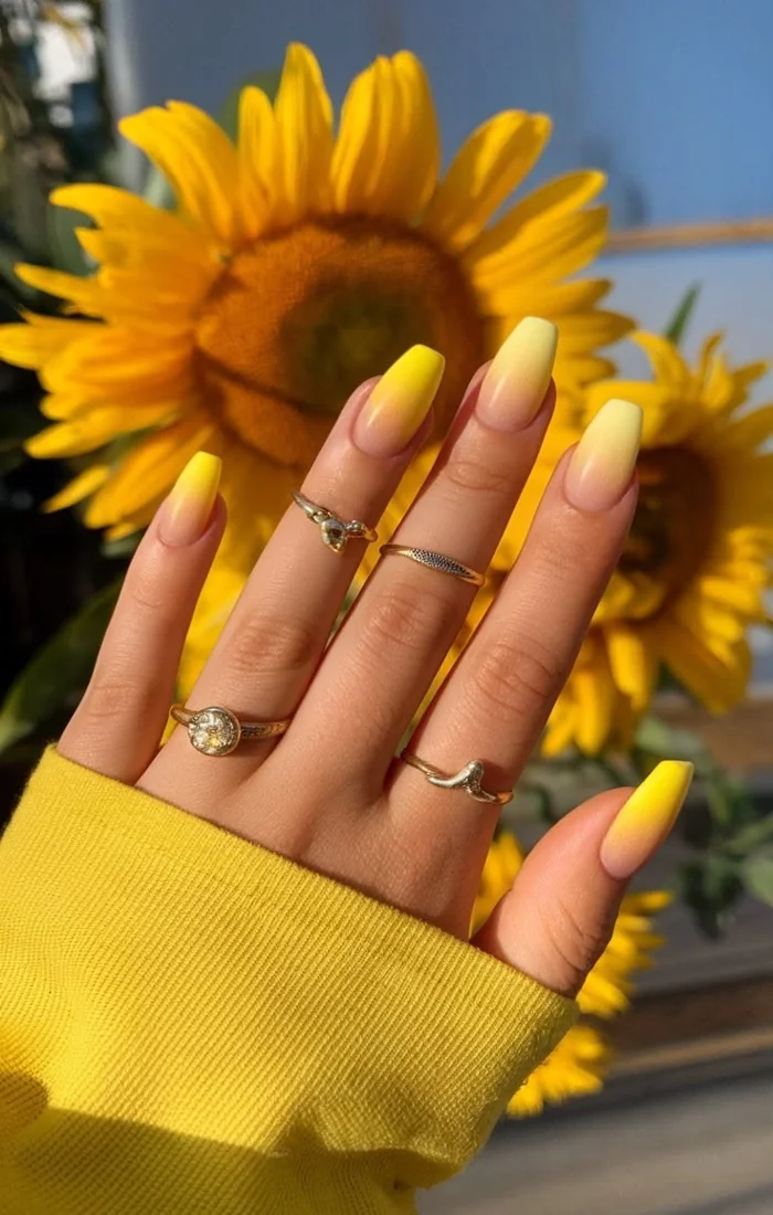 Bright yellow summer nails with a shiny finish on short square nails. Bright yellow summer nails with a shiny finish on short square nails.