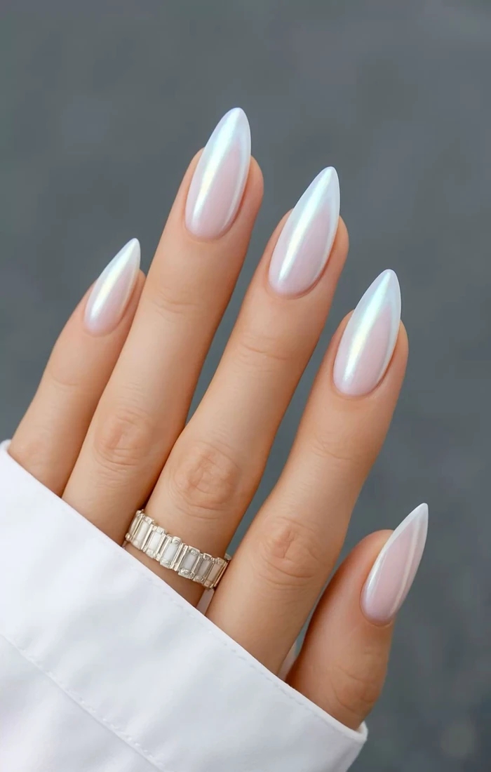 Glossy white summer nails with a clean finish on short oval nails. Glossy white summer nails with a clean finish on short oval nails.