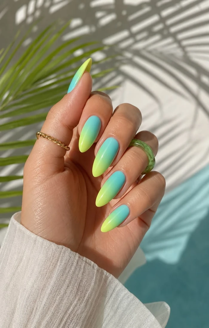 Neon summer nails combining vivid pink and lime green with a glossy finish.