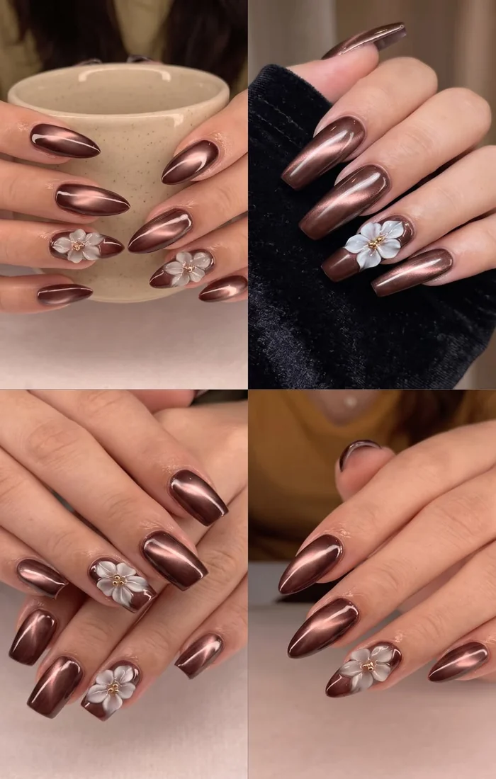 Pink cat eye nails decorated with delicate white floral nail art. Pink cat eye nails decorated with delicate white floral nail art.