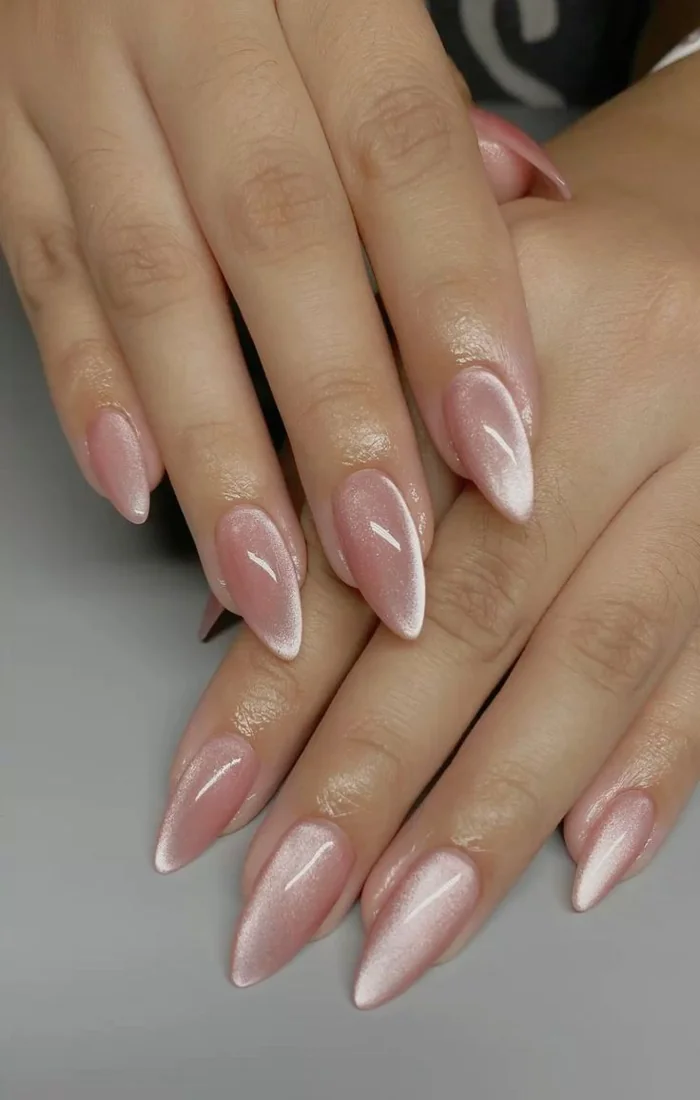 Rose gold cat eye nails with blush copper magnetic shimmer. Rose gold cat eye nails with blush copper magnetic shimmer.