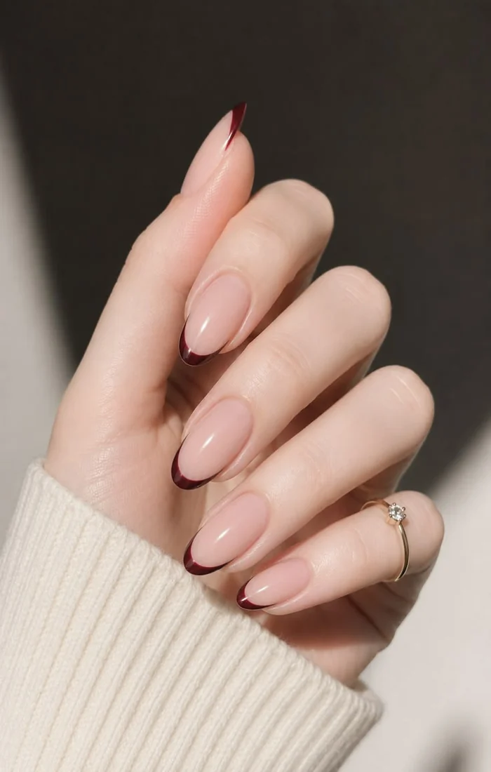 Short burgundy micro French fall nails with a sheer pink base Short burgundy micro French fall nails with a sheer pink base