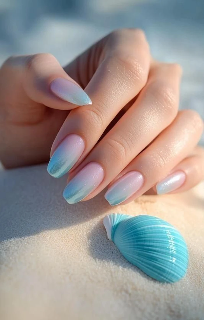Simple summer nails in a sheer nude shade with a natural glossy finish. Simple summer nails in a sheer nude shade with a natural glossy finish.