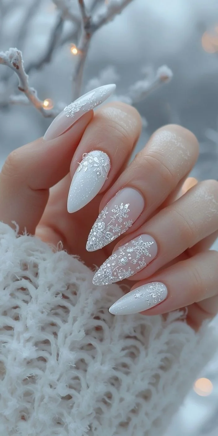 White French Christmas nails with delicate snowflake design White French Christmas nails with delicate snowflake design